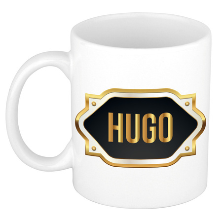 Naam cadeau mok / beker Hugo met gouden embleem 300 ml