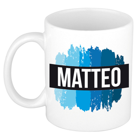 Naam cadeau mok / beker Matteo met blauwe verfstrepen 300 ml