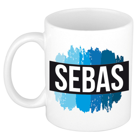 Name mug Sebas with blue paint marks  300 ml