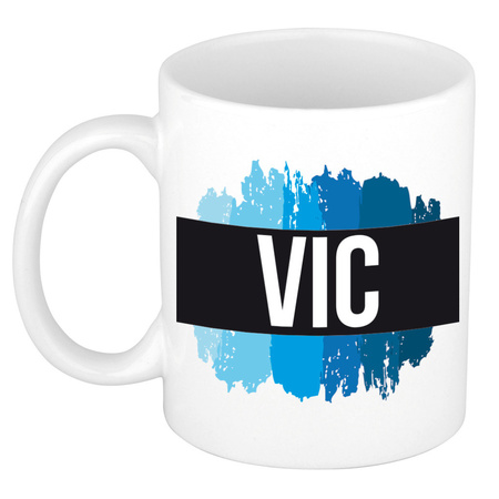 Name mug Vic with blue paint marks  300 ml